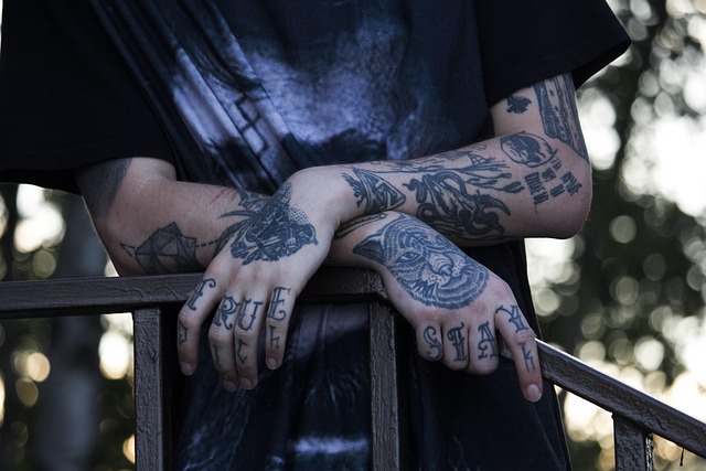 blackwork tattoo with bold lines and solid fill under studio lighting